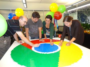 The Chrome team at Google helping to build a 5 foot version of the Chrome logo