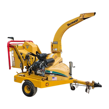 Yellow Vermeer wood chipper machine with red and black components.