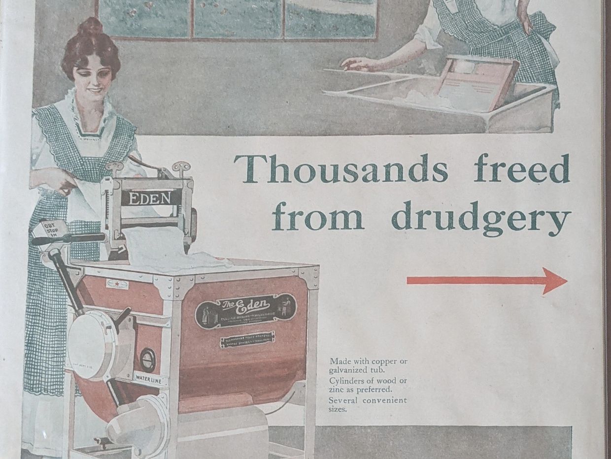 old add of woman washing clothes in an Eden. "thousands freed from drugery"