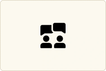 Icon of two people exchanging speech bubbles representing communication.