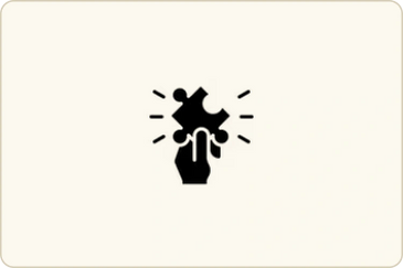 Hand holding a glowing puzzle piece symbolizing idea or solution.