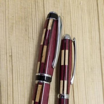 Skyscraper Series Magnum and Mini Magnum in Purple Heart, Maple and African Wenge