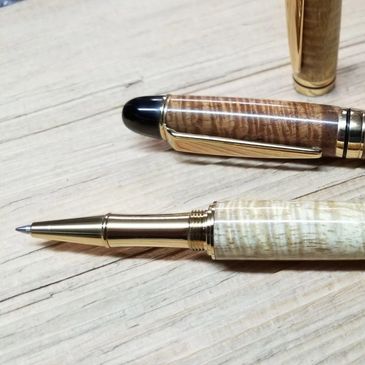 Solid Hawaiian Curly Koa pens in curly Koa sap and curly koa heart