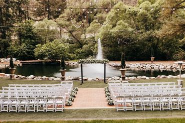 White wedding flowers for ceremony