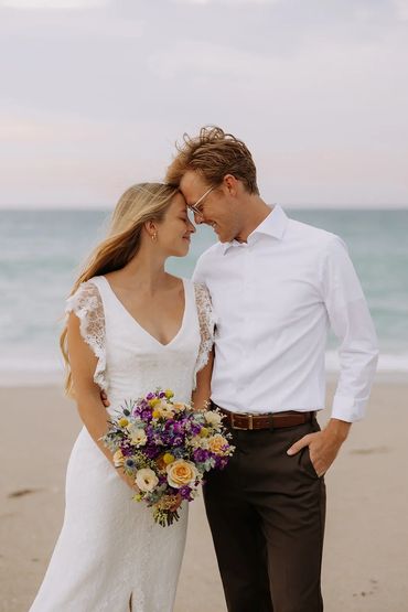 Beach wedding with pastel flowers