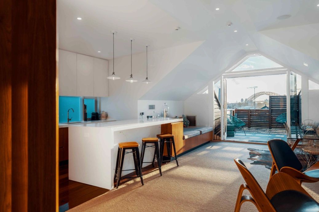 Bright modern kitchen with a view of Sydney Harbour Bridge.