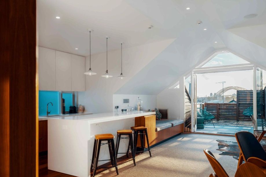 Bright modern kitchen with a view of Sydney Harbour Bridge.