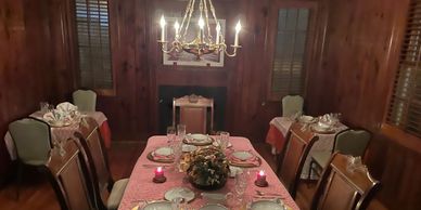 Flatware, glasses, candlelight,tablr cover, flowers and table setup