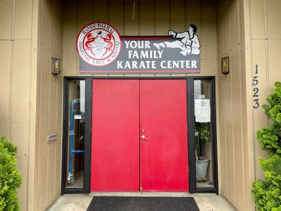 "Your Family Karate Center" sign outside and above the front door.