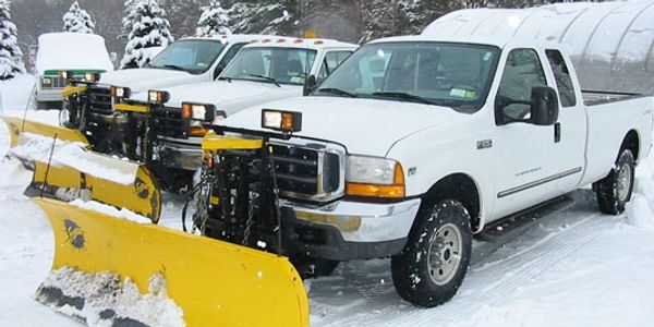 Snow plow trucks ready to plow & salt