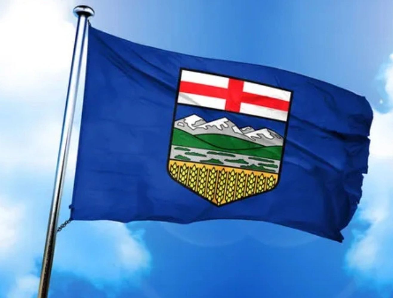 Blue flag with a coat of arms featuring mountains and a red cross.