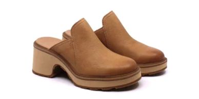 Sore Mules feature rubber outsole; with a 2 1/4-inch heel and 3/4-inch platform.