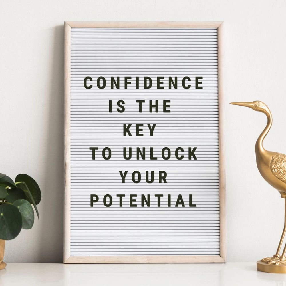 letter board with inspirational quote that reads "confidence is the key to unlock your potential