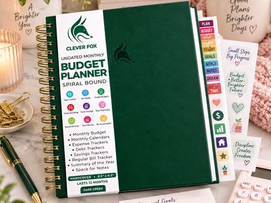 Spiral-bound Clever Fox budget planner in dark green.