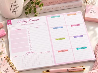Weekly planner layout with notes and habit tracker.