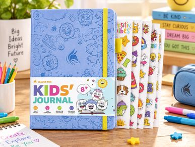 Colorful kids' journal with fun stickers and exercises on a wooden table.
