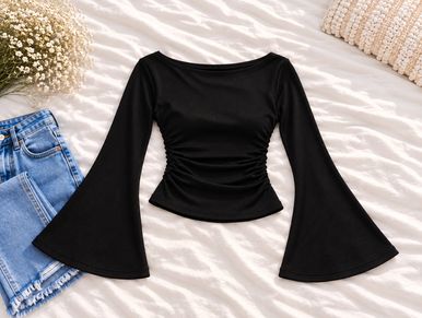 Black long-sleeve top with flared sleeves.