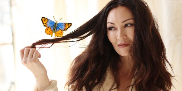 Mary Christina Brown with a butterfly. reminding you, you are not a lone.