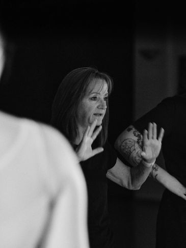 teachers giving feedback on ballet performance