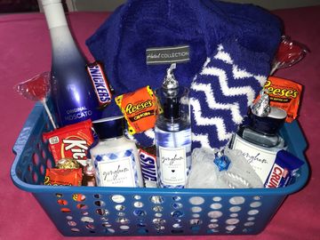 Holiday basket C.)
Fragrance set
Candles 
Wine
Chocolate 
Robe
Loofah 
Fuzzy Socks