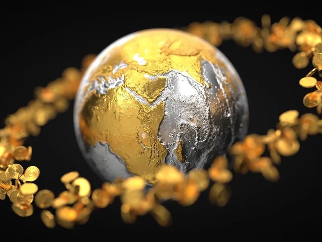 Golden and silver globe with golden coin ring representing money consciousness