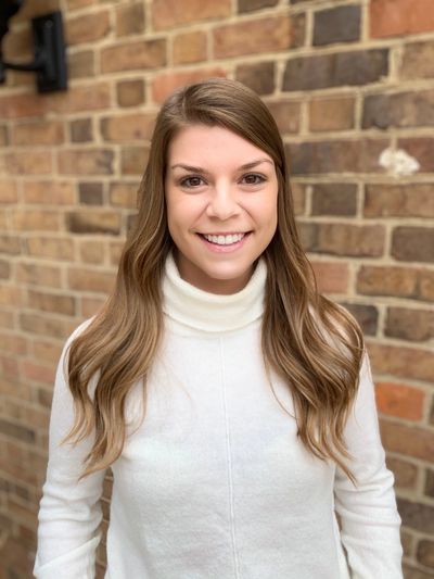 Sarah Hess, dietitian licensed in Missouri. Woman smiling at the camera.