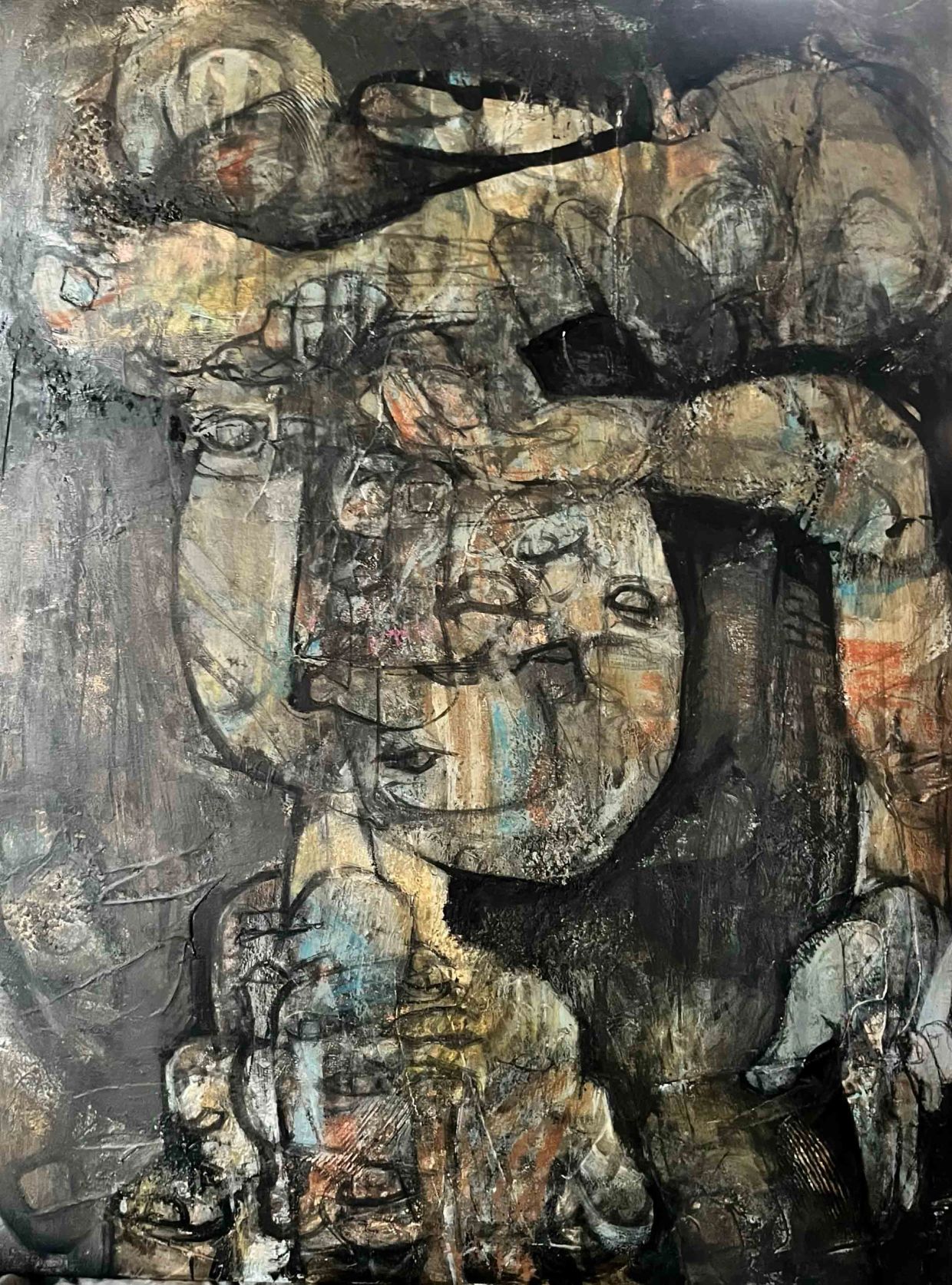 Abstract painting with overlapping faces and muted colors.