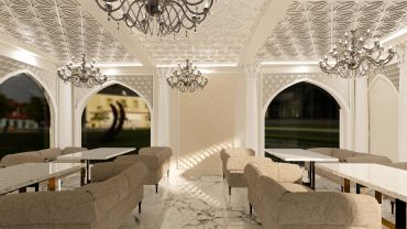 Elegant room with chandeliers and arch windows.