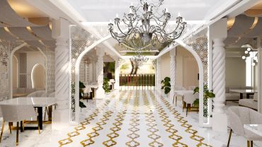 Luxurious white and gold interior with chandeliers and arches.