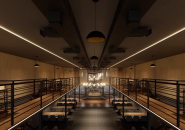 Modern industrial-style interior with warm lighting.