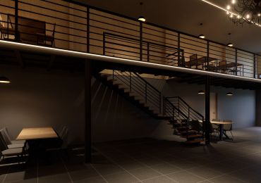 Modern interior with staircase and dining tables.