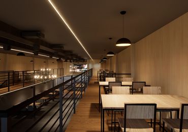 Modern dining area with wooden furniture and ambient lighting.