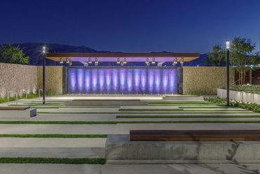 One Legacy - Azusa, CA Long, tall, stone clad cascading water wall, colorful lighting RGB show