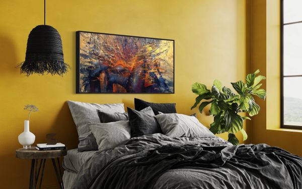 Cozy bedroom with mustard yellow walls, dark bedding, and vibrant abstract art.