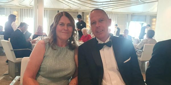 Male and female couple dressed up for formal night.