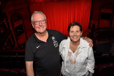 Lorrie and Peter smiling at the camera
