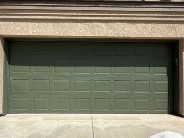 A refinished garage door providing a refreshed look and enhanced curb appeal.
