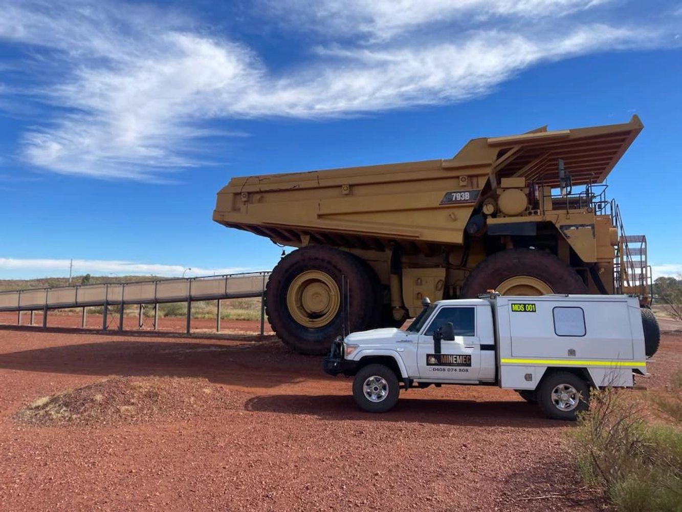 Dump truck with Minemec diesel services vehicles