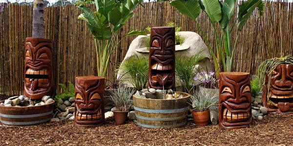 tiki totem poles tropical landscapes landscaping bamboo landscape design water features custom work