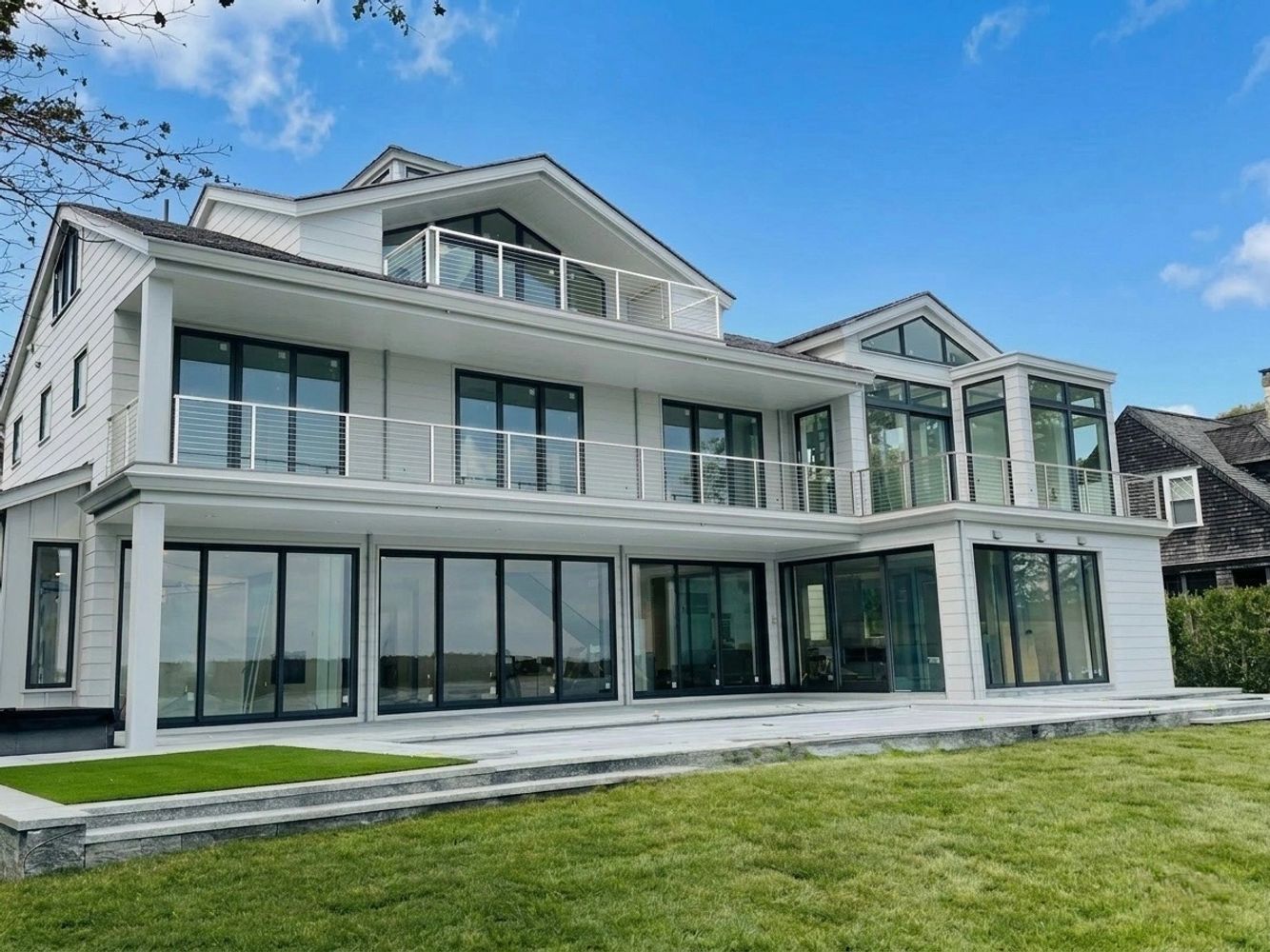 Modern white house exterior railings.