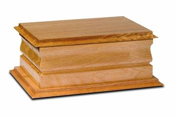 A Light Oak ashes casket.