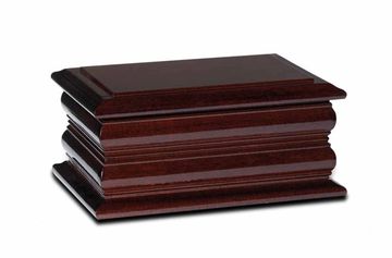 A Dark Mahogany Oak ashes casket. 