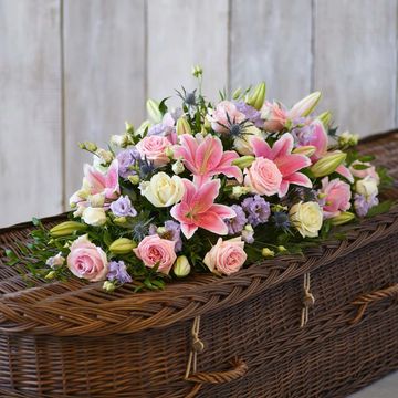 Rose And Eryngium Casket Spray