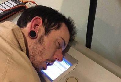 Me using my KORG as a pillow. Passed out while making this new album, dad took a photo.