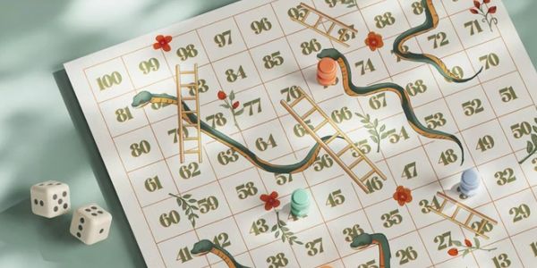 A Snakes and Ladders board game with dice and colored pieces.