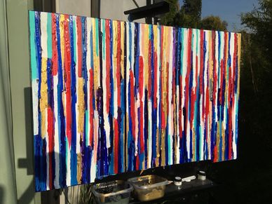 Abstract vertical stripe painting with vibrant colors.