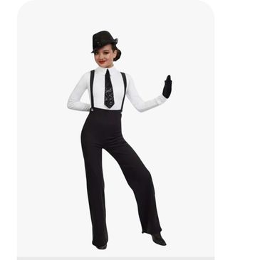 A woman in a black and white vintage dance costume with a hat and gloves.