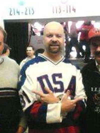 Me, in the Jim Craig USA Hockey jersey, with some of my favorite callers to my radio show at an Amer