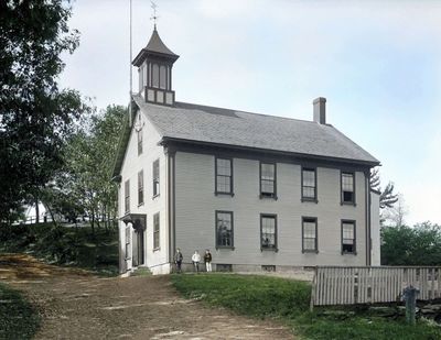 An old schoolhouse with bell steeple