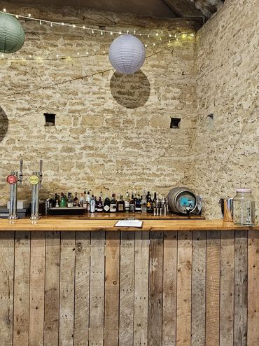 Rustic pallet bar in beautiful barn venue